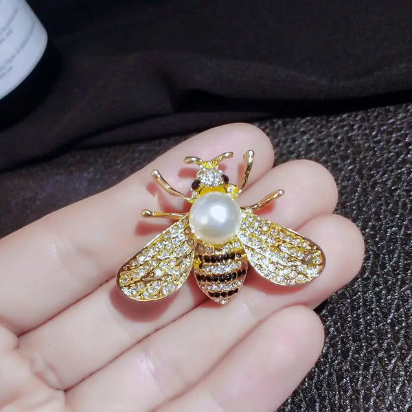 Bee badge brooch