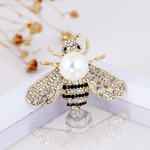 Bee badge brooch