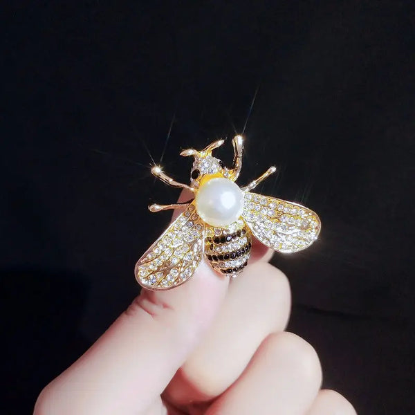 Bee badge brooch